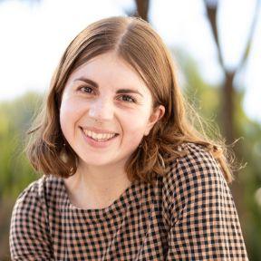 Elaine Obran smiles at the camera.