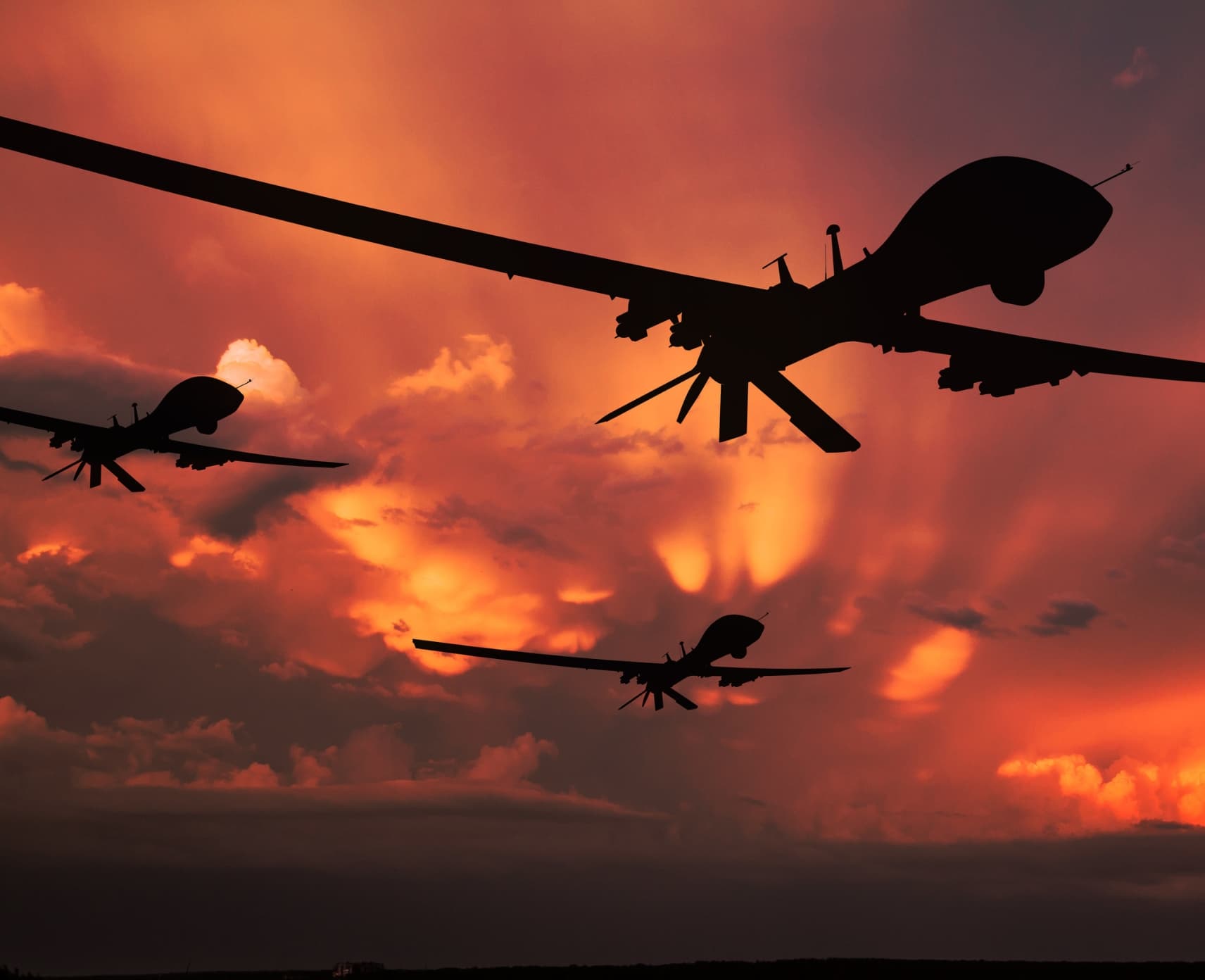 Unmanned drones flying in red skies, AI in war