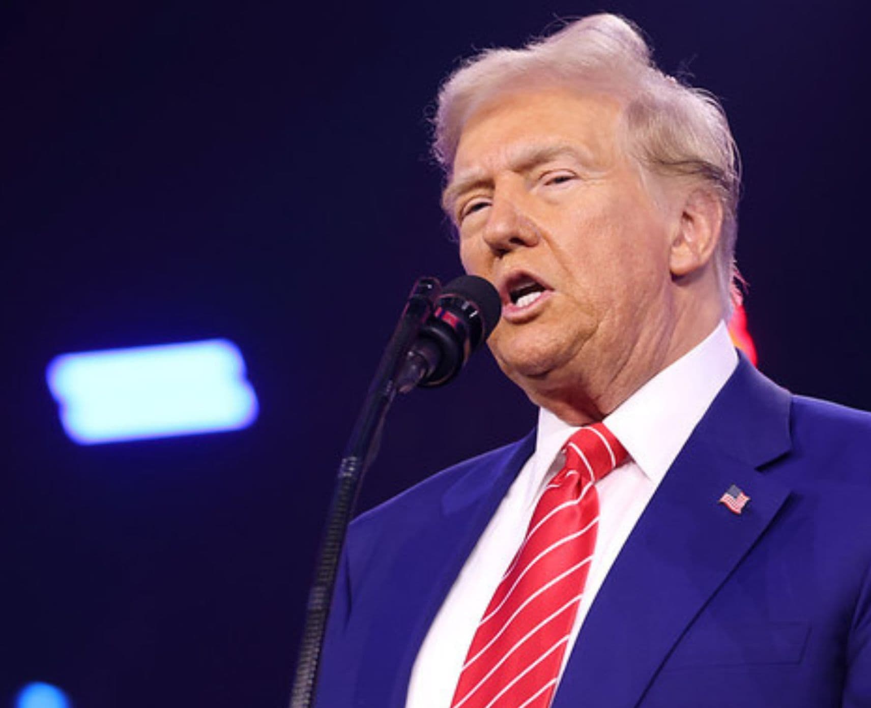 President Trump speaks at a podium