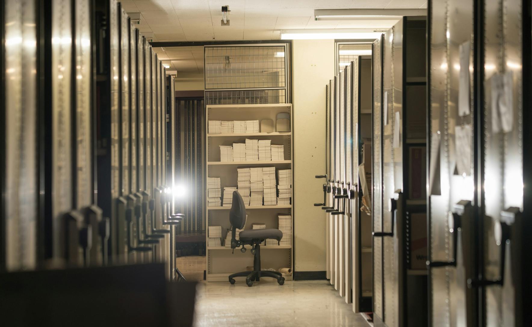 Rows of archives in an ANU storeroom