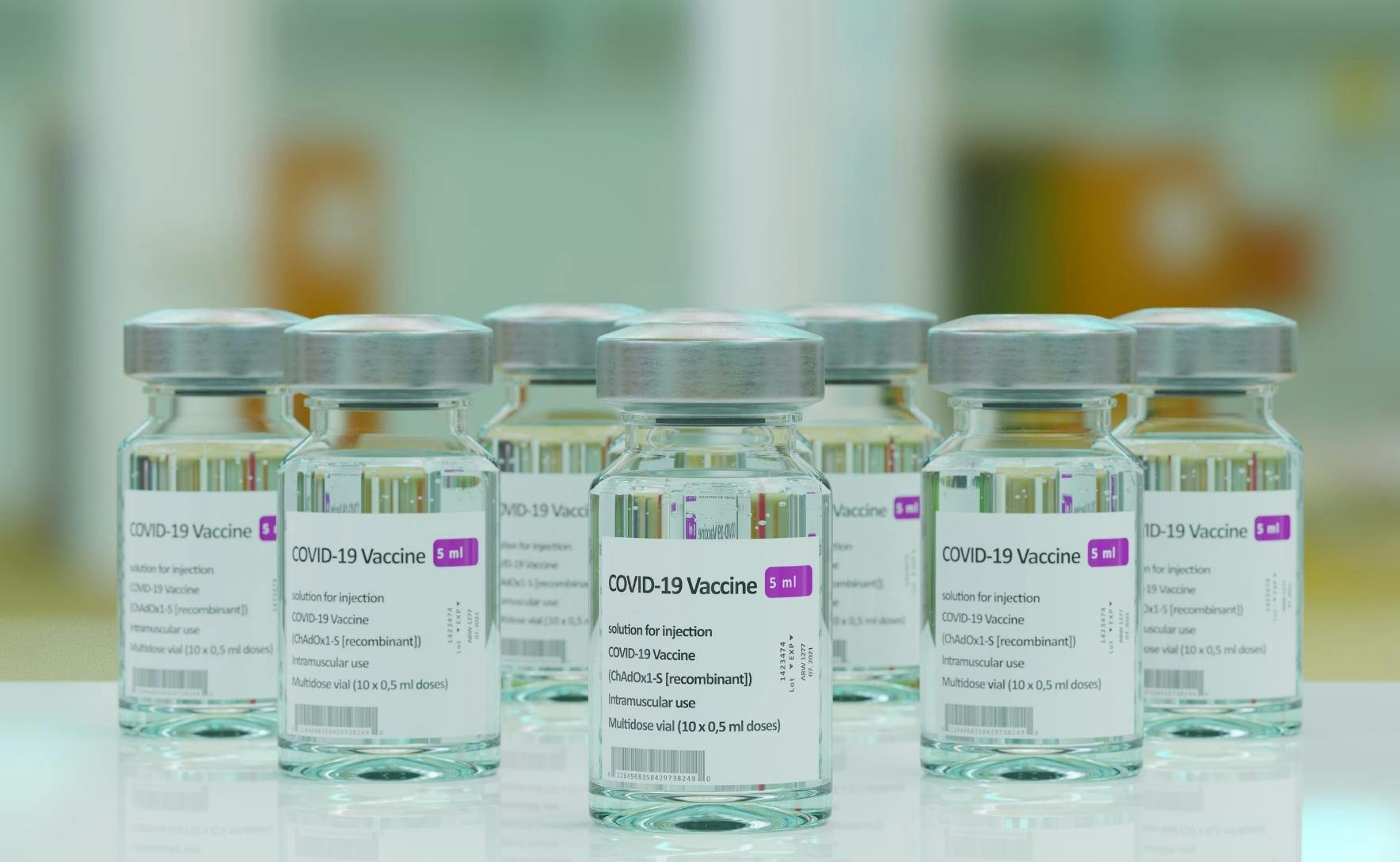 Vaccine vials labelled COVID-19 vaccine.
