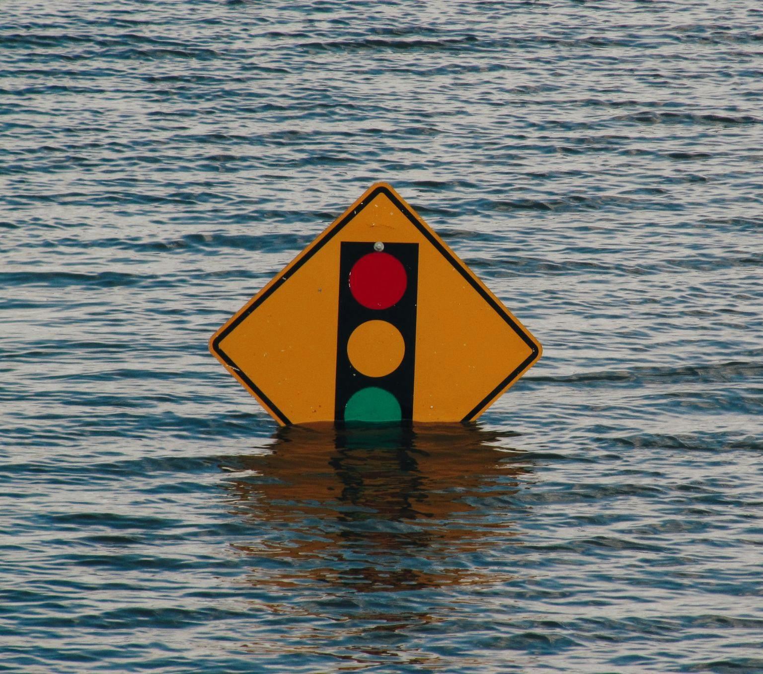 Sign that is mainly underwater due to flooding