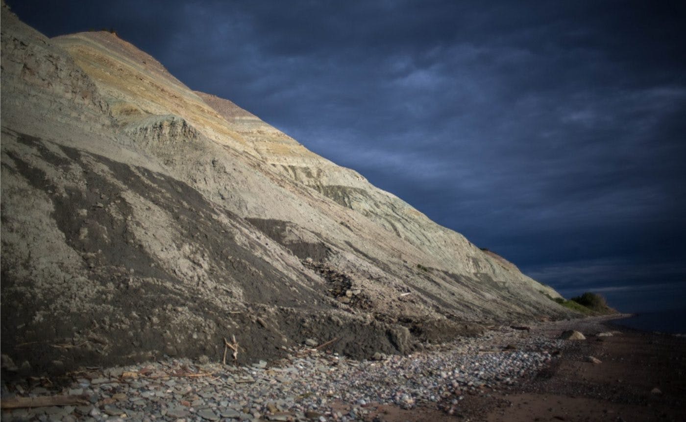 The cliffs near Russia's White Sea, where the ANU researchers retrieved the Ediacara biota fossils. The sky is dark and the picture was taken at night.