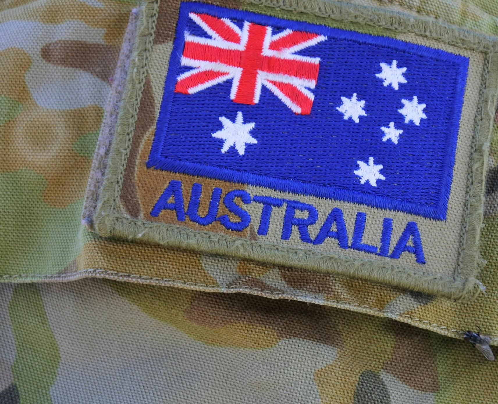 Close-up of Australian flag on military camouflage uniform
