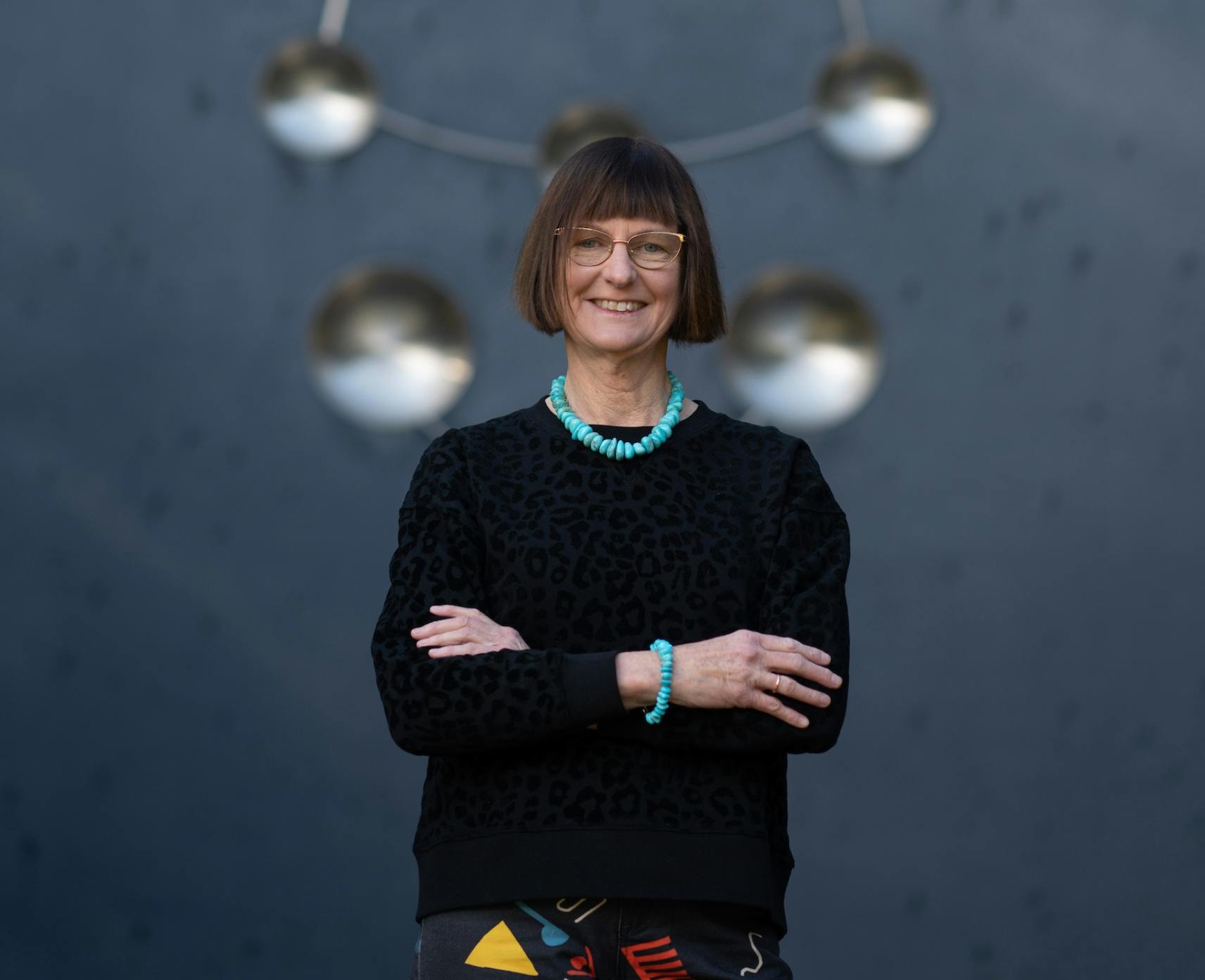Distinguished Professor Susan Scott poses for photographs at ANU