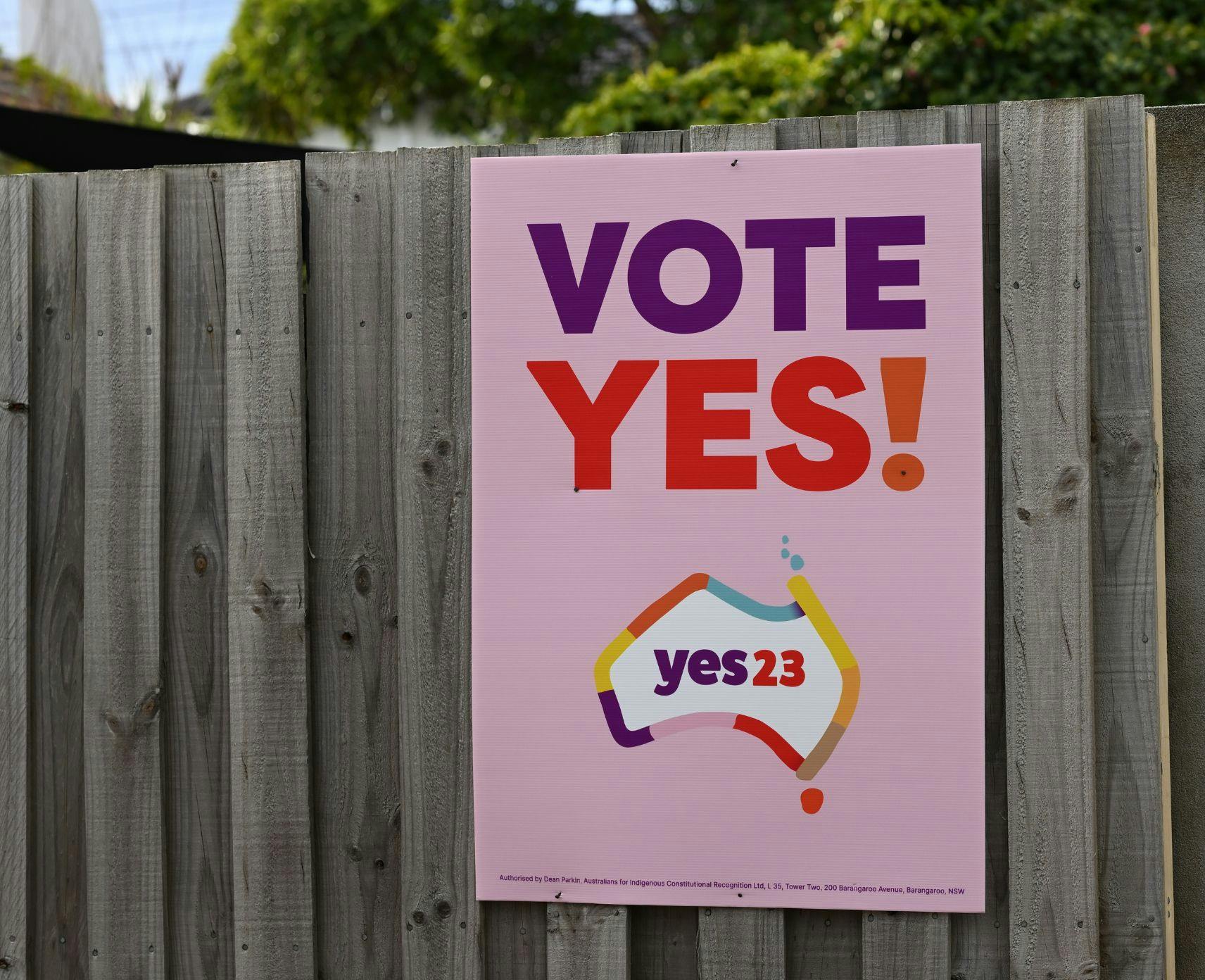 yes23 campaign sign on a residential fence