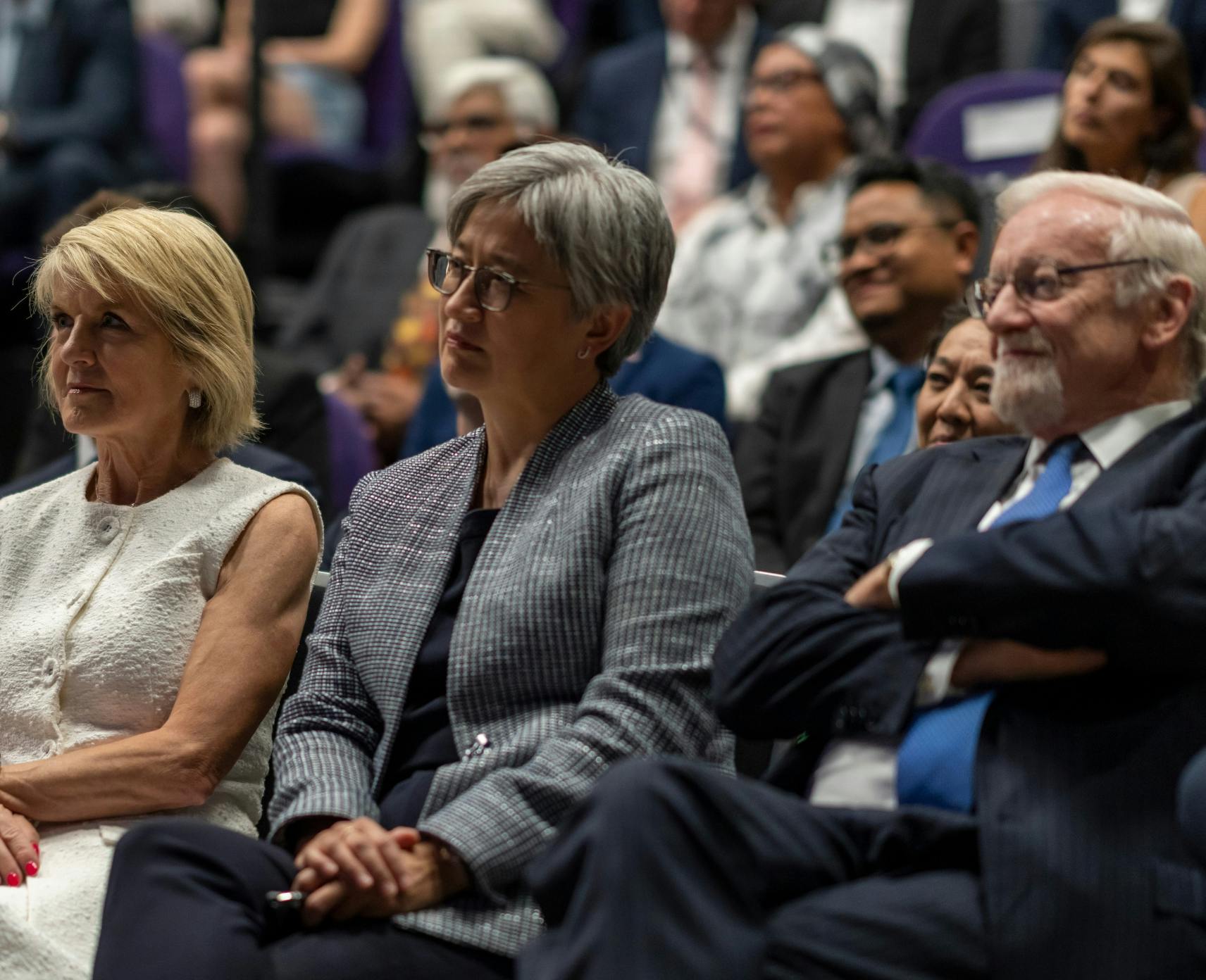 The Hon Julie Bishop, the Hon Penny Wong and Professor the Hon Gareth Evans AC KC in audience at the Australian National University.